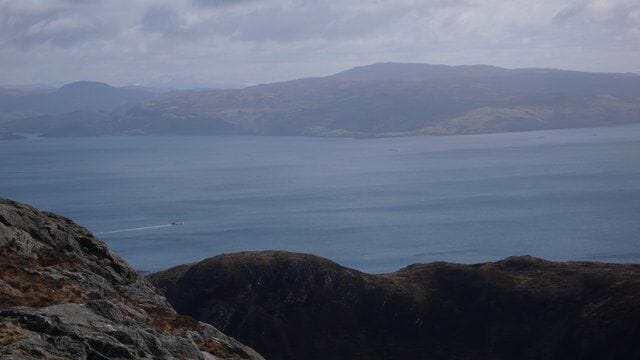 Druim na Gearr and Sound of Mull The caledonian Macbrayne ferry is heading across the Sound of Mull towards Tobermory. Druim na Gearr in the foreground.