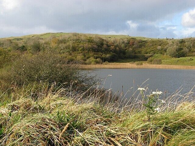 Kilcheran Loch A steep bank separates the road down the south-east of Lismore from Kilcheran Loch, but a short scramble up the slope gives this view towards the higher ground in the centre of the island.