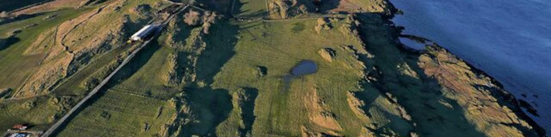 Lismore Island An aerial view of about two thirds of Lismore Island co-ordinated on Kilcheran Loch in the top half of the image.
