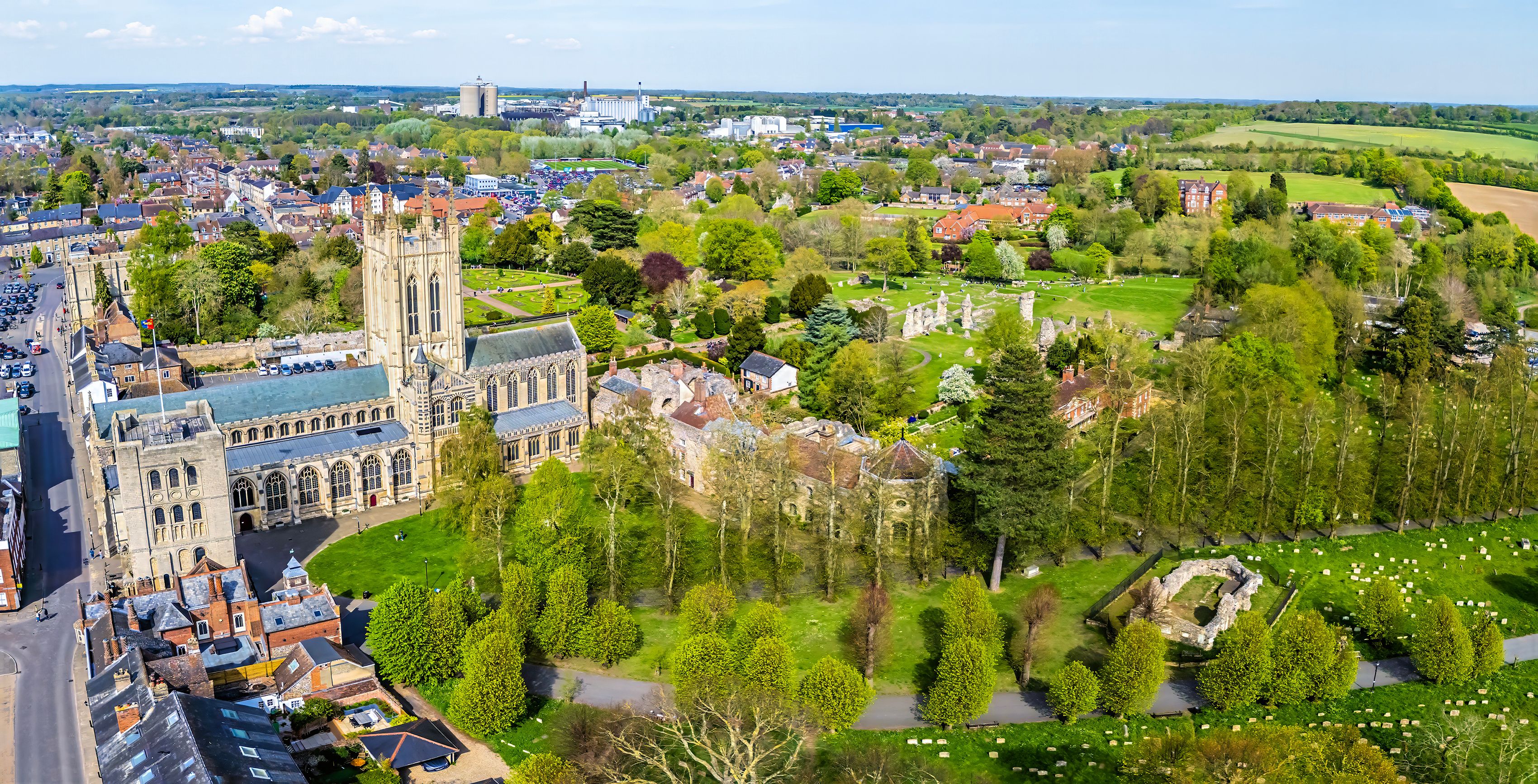 A historic cathedral, a cemetery, and surrounding residential areas.