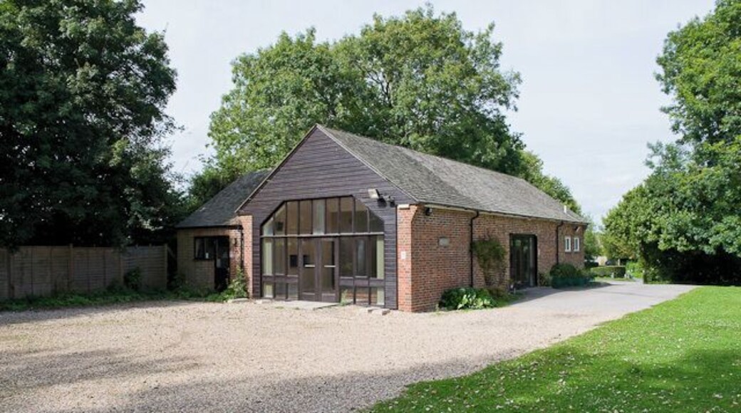 Itchenor Memorial Hall The village hall, funded partly by the Millennium Commission and operated by West Itchenor Parish Council. There is car parking space here. At the entrance there is a notice which reads PRIVATE PROPERTY NO UNAUTHORISED PARKING; I find this objectionable. A hall constructed and maintained by the tax payers ought to be generally available for reasonable use by the public as, indeed, most village hall car parks are. The nearest public car park is over 0.7 Km away via a narrow road with no footway. The Salterns Way passes through West Itchenor just beyond this hall.