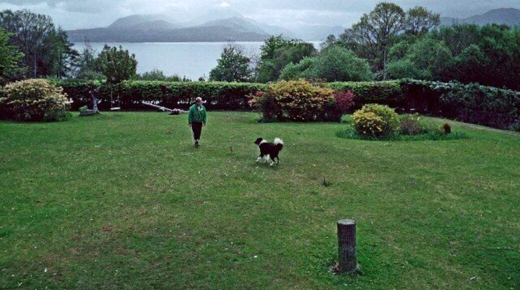 Garden of Duisdale Hotel, Duisdale, Isle of Skye, with Sound of Sleat in background. Garden of Duisdale Hotel, Duisdale, Isle of Skye, with Sound of Sleat in the background. This area is on the east coast of the island and the mountains in the distance are on the mainland.