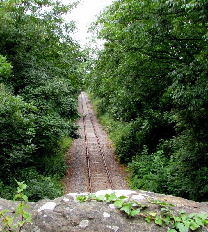 Single-track railway west of Nibley Lane near Iron Acton, viewed from Robin Hood Overbridge. Shown on maps as Mineral Railway, this line is part of the old Thornbury branch line that has been retained to serve Tytherington Quarry.