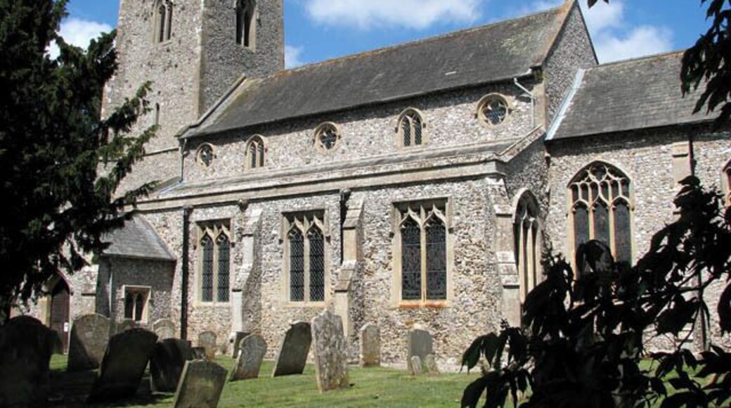 St Michael's church. St Michael's church is hemmed in by houses from all sides > 1300902 and difficult to reach. Although its tower can occasionally be glimpsed over roofs and through trees, there is only a narrow driveway > 1300904 and a short section of path leading to it. The churchyard contains a number of interesting old headstones and the remains of an ancient stone cross > 1300916 are situated right in front of the south porch > 1300909 which dates from the 15th century. The main body of the church > 1300908 was built a century earlier and the chancel wall contains lumps of carstone. The church interior > 1300927 - 1300941 was extensively restored by the architect G.E. Pritchett in the mid-19th century. It was during this time that the stained glass was put in many of the windows. According to the Norfolk churches website, St Michael's contains probably the best collection of late 19th and early 20th century glass of any small church in East Anglia > 1300958 - 1300968 - 1300974. Most of the stained glass windows were made in the workshop of the O'Connors and there is work by Robert Bayne and Christopher Webb. The originally square font has been cut at some state to form an octagon, ruining some of the carving > 1301005 - 1301020. The rood screen > 1300931 is also largely original albeit restored and covered with dark varnish. There is a three figure brass > 1301039 on the west tower wall which dates from 1623 and features Agnes Brigge and her parents. This church is kept locked but a key is available on request. http://www.norfolkchurches.co.uk/ingoldisthorpe/ingoldisthorpe.htm