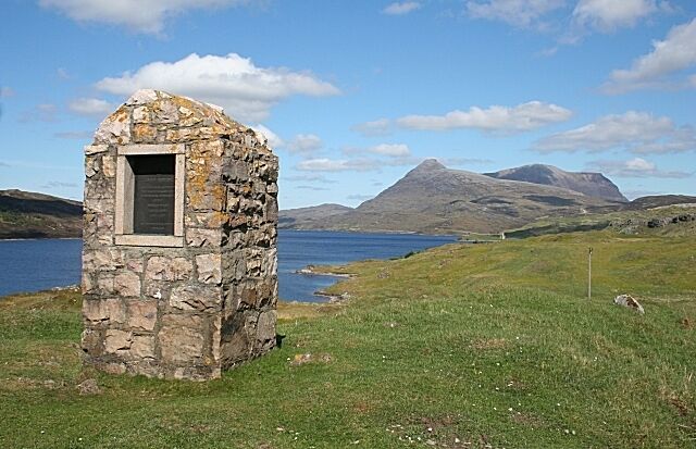 Peach and Horne Monument Ben Peach and John Horne were the geologists who mapped Assynt and made a major contribution to understanding the complicated geology of the Moine Thrust Zone. In the background is Cuinneag (Quinag) above Loch Assynt.