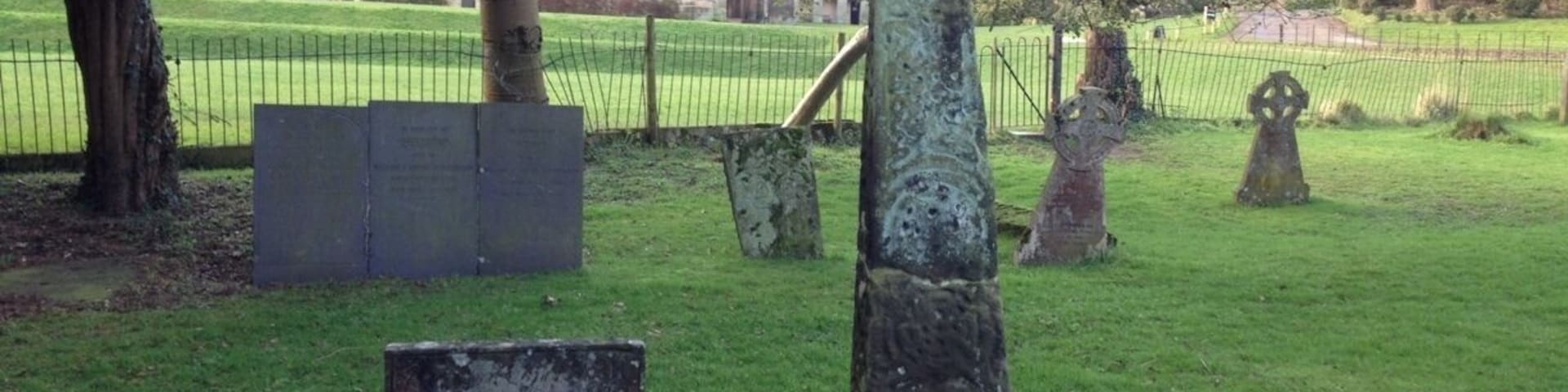 Remains of one of the Saxon crosses in the graveyard of the Church of the Holy Cross, in Ilam, Derbyshire. The church dates from Saxon era although it was considerably rebuilt in Norman and early English times. St. Bertram is buried here.