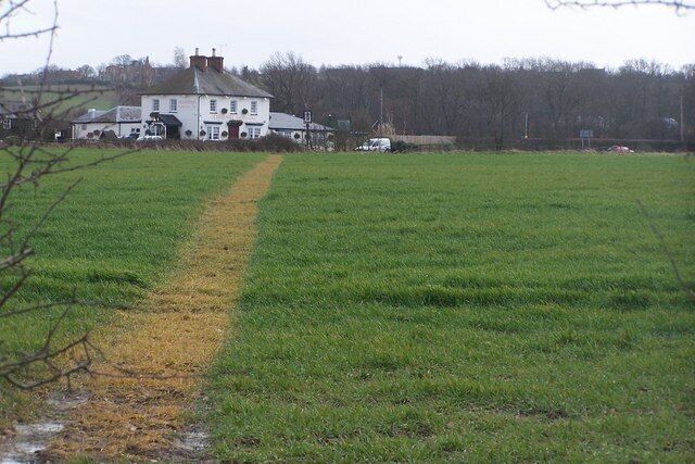 Happy days Footpath across a field - with a pub at the end. The Chequers near to Houghton Conquest. A very fine hostelry!