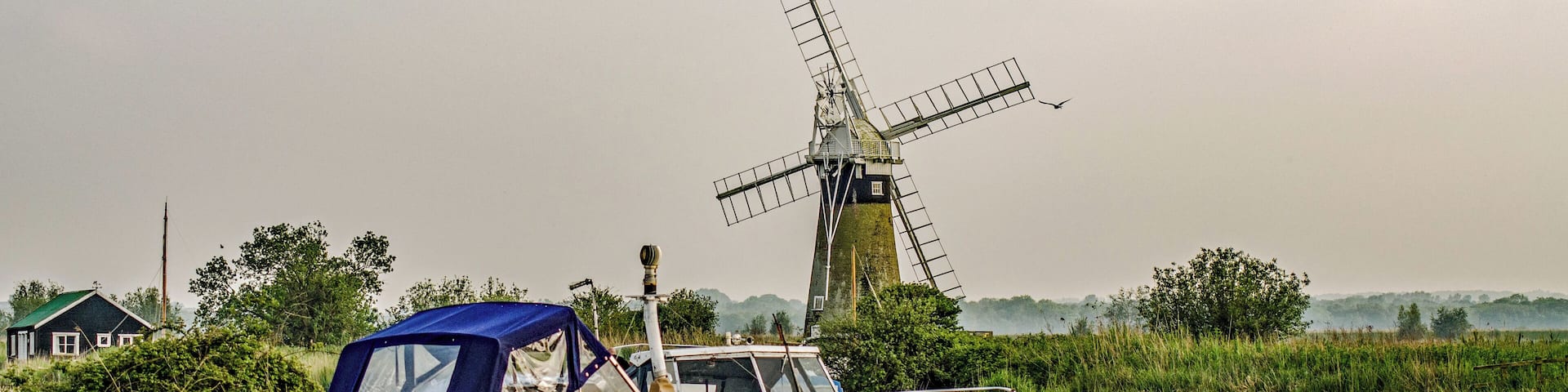 Two Windmills in one location on the Norfolk Broads. Other mill is currently clad in scaffolding. Idilic countryside spot with plenty of boat moorings and road access.