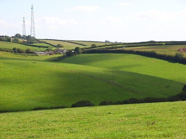 Downland, Hooke Looking across a valley to Hill Farm and two of Rampisham Down's many masts.
