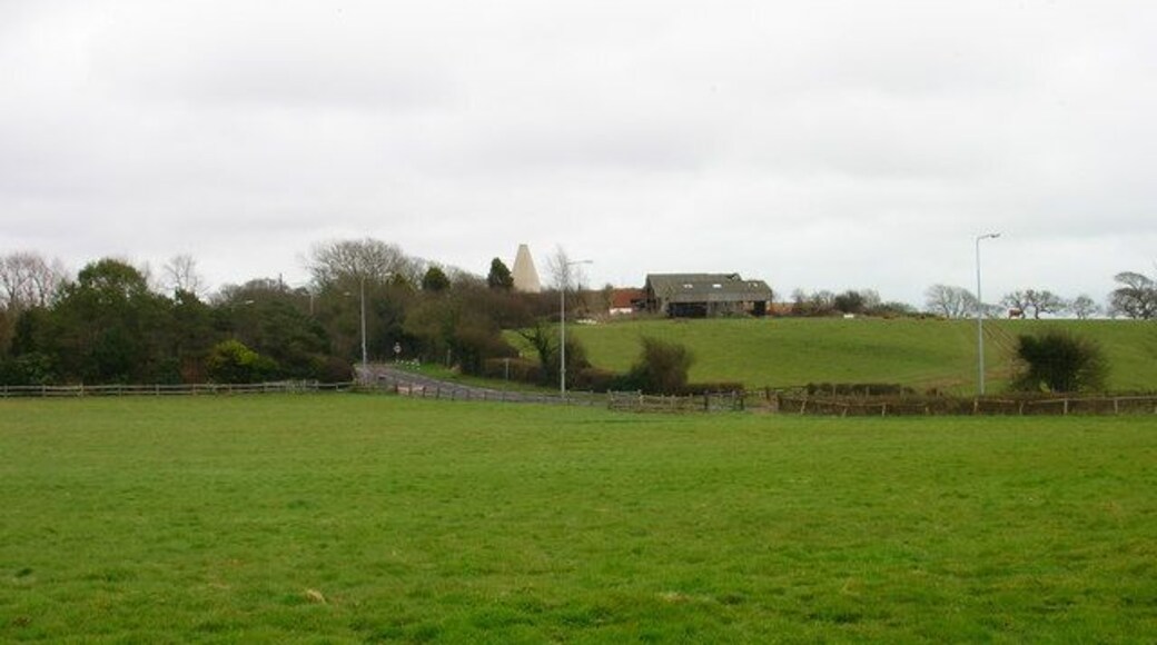 Barnhorn Oast Farm Viewed from the footpath just to the south of the UAE Technical Training Campus and looking across the A259 Barnhorn Road. Beyond the farm the land drops down into the Pevensey Marshes.