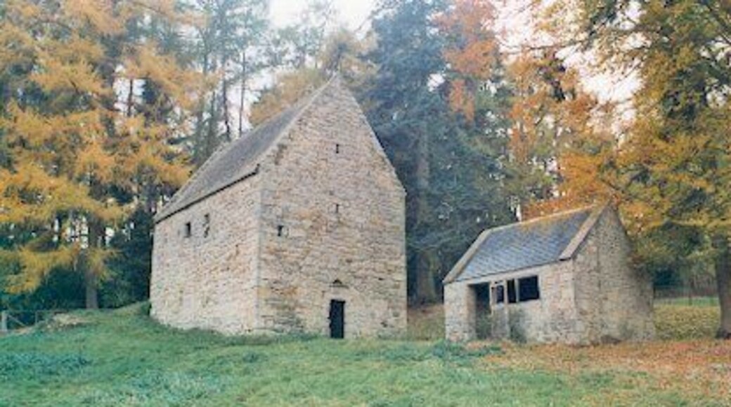 Woodhouses Bastle Bastles, such as this one at Woodhouses, were a poor man's tower and barn in one. Here it can be seen along with a small cow house. This Bastle is dated 1602 with initials of William Potte over the lower doorway. It was restored in the 1980's and is open to the public.
