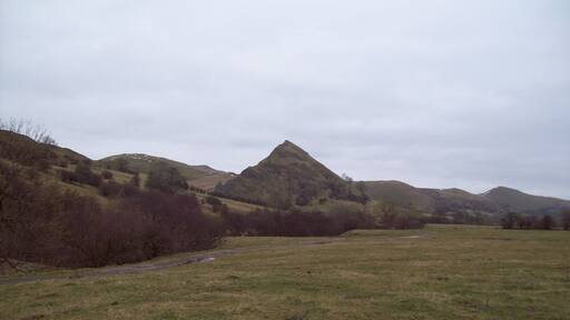 Parkhouse Hill viewed from the West From this angle, the hill takes on almost perfect conical proportions. This photo was taken on a mainly overcast Sunday in late February, although overall visibility was good.
