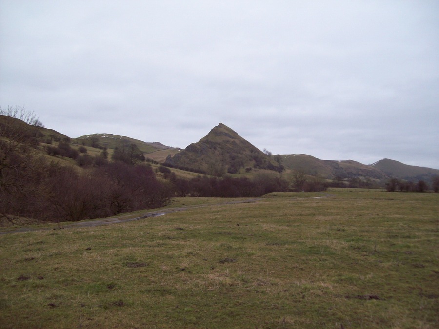 Parkhouse Hill viewed from the West From this angle, the hill takes on almost perfect conical proportions. This photo was taken on a mainly overcast Sunday in late February, although overall visibility was good.