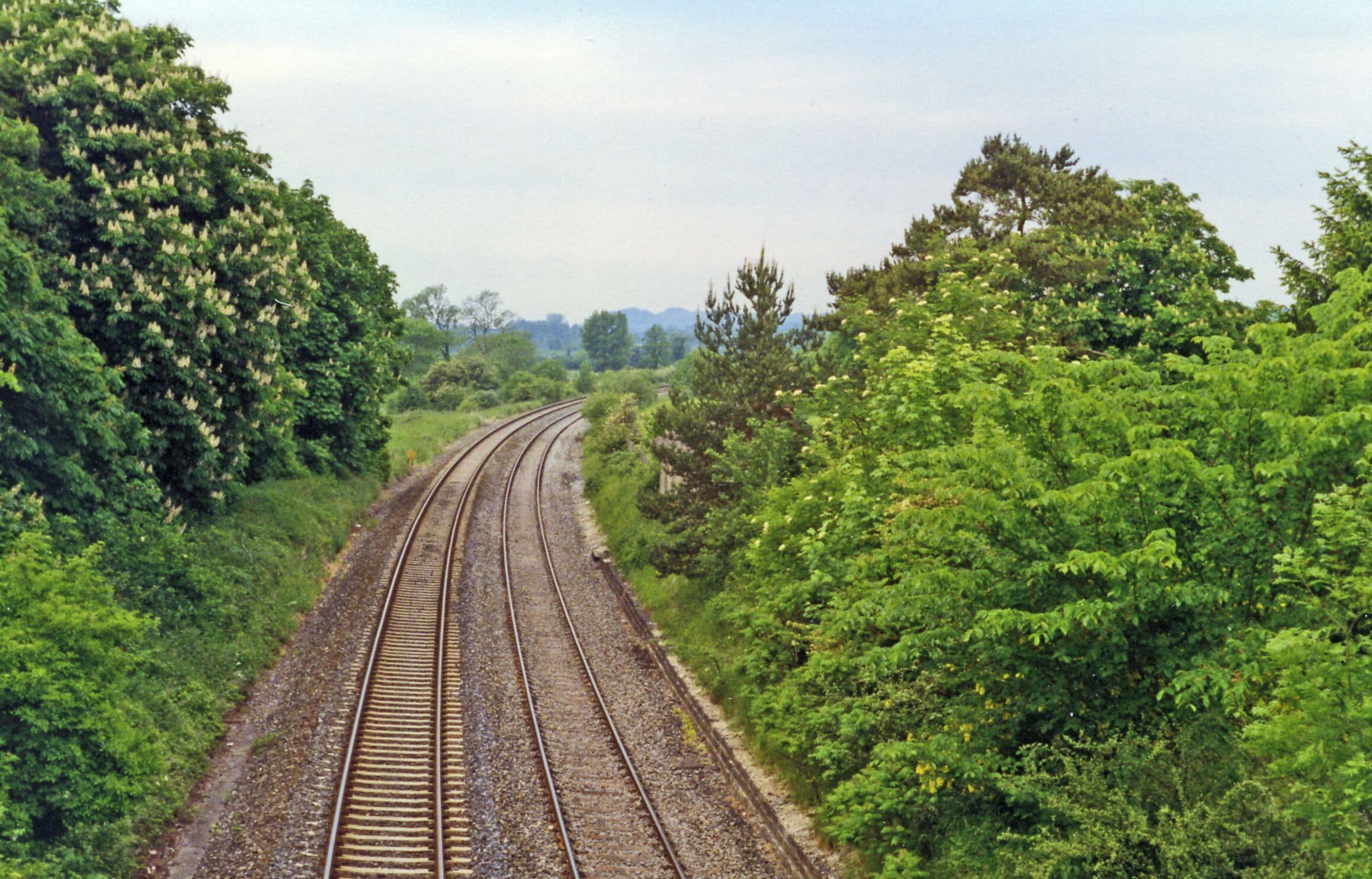 Site of former Heytesbury station. View NW, towards Westbury: ex-GWR (Bristol etc.) - Westbury - Salisbury secondary main line. The station was closed 19/9/55, but the line remains an important link to Southampton etc. from Bristol and South Wales.
