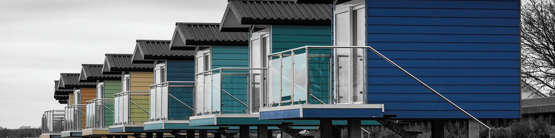 Uninteresting weather conditions, so waded out into the sea for a long exposure and to highlight the colours of the beach huts.