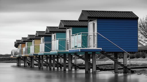 Uninteresting weather conditions, so waded out into the sea for a long exposure and to highlight the colours of the beach huts.