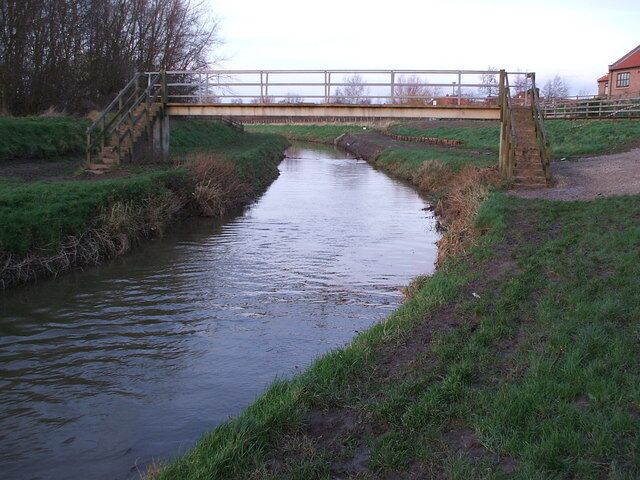 Footbridge over the River Foss at Earswick Village, York This bridge carries the Recreational Path, Ebor Way (and Centenary Way) across the River Foss west of the village of Earswick, north of York. It is shown as FB on the 1:25000 scale OS map while not shown on the 1:50000 sheet, (although the crossing of the public footpath is).