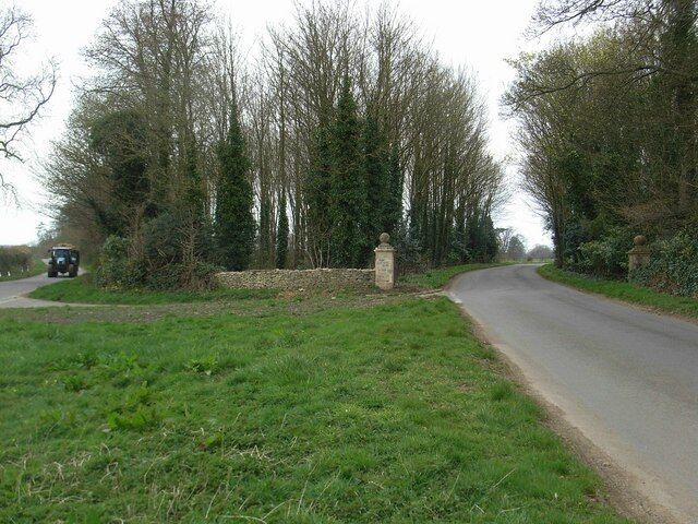 Road junction The road to the right (to Hatherop) has gate posts for it. The gate post on the left has the inscription: "400.866 feet"- possibly the height above sea level as the nearby spot height is 122 metres.