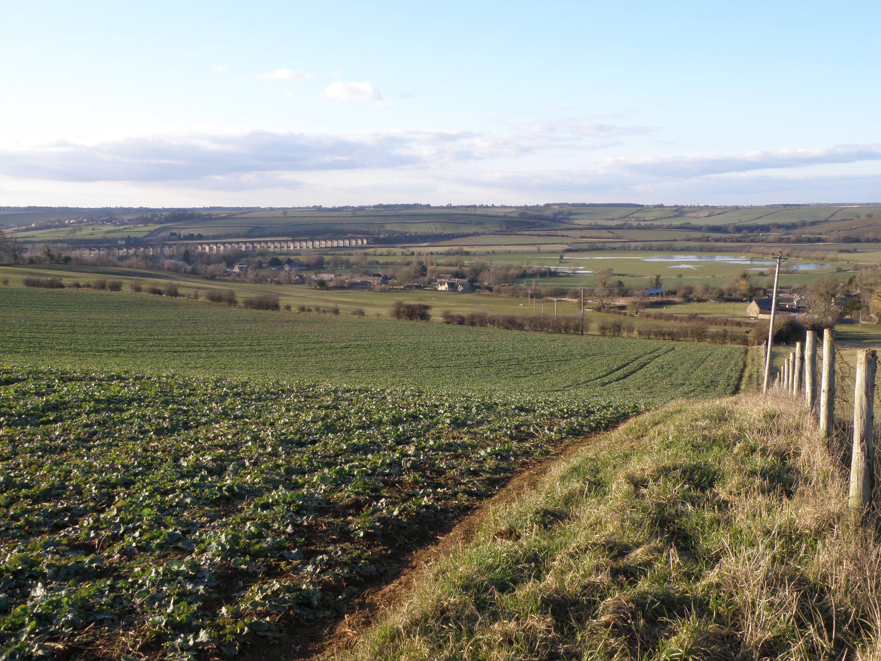 Welland Valley A view over Harringworth and Shotley showing the railway viaduct and the flood meadows near the river Welland.