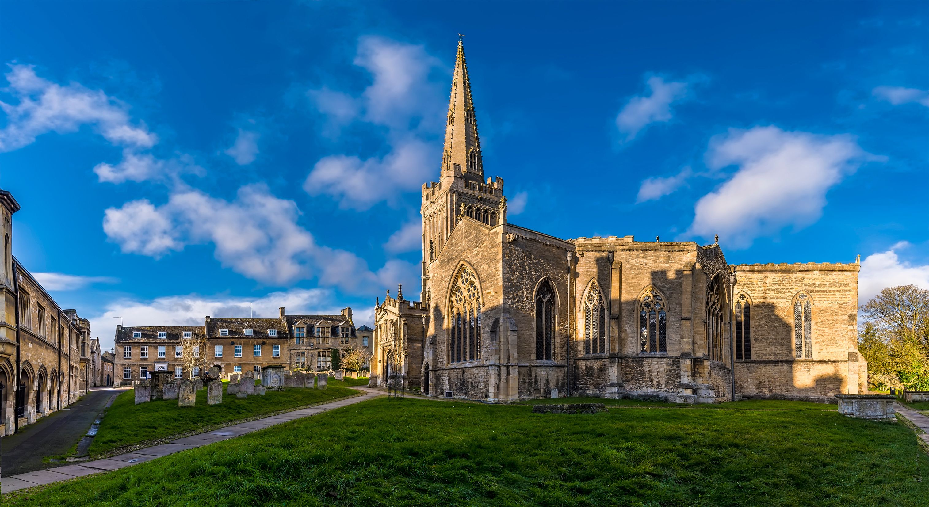 A view toward the church and surrounding area in Oundle, UK on a bright sunny day