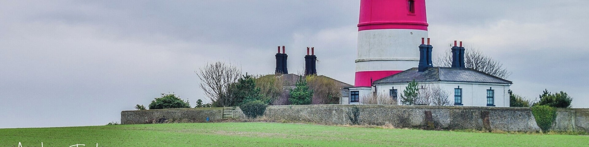 Happisburgh Lighthouse in Happisburgh on the North Norfolk coast is the only independently operated lighthouse in Great Britain. It is also the oldest working lighthouse in East Anglia. The building was constructed in 1790 as one of a pair of candle-powered lights. It was electrified in 1947. The tower is 85 ft tall, putting the lantern at 134 ft above sea level.
