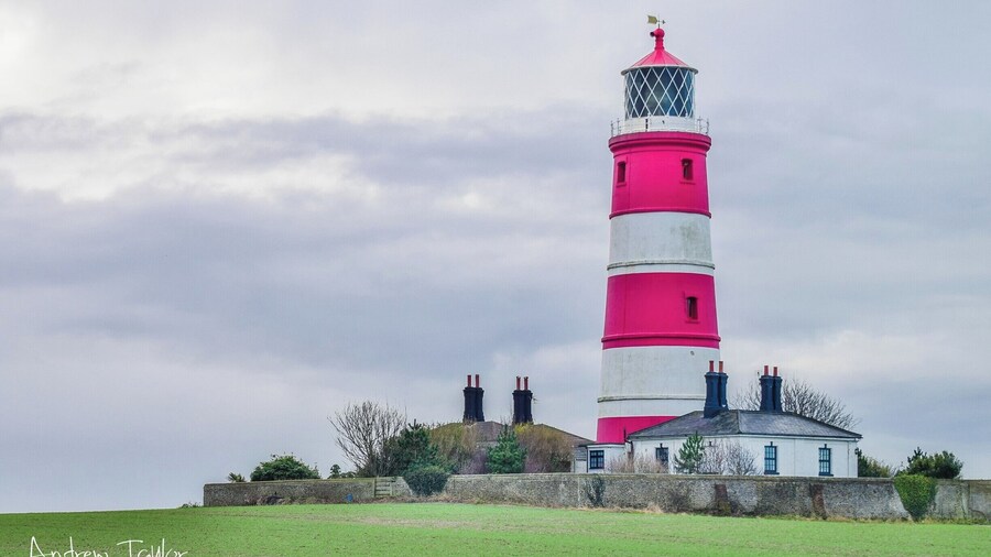 Happisburgh Lighthouse in Happisburgh on the North Norfolk coast is the only independently operated lighthouse in Great Britain. It is also the oldest working lighthouse in East Anglia. The building was constructed in 1790 as one of a pair of candle-powered lights. It was electrified in 1947. The tower is 85 ft tall, putting the lantern at 134 ft above sea level.