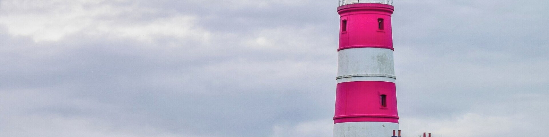 Happisburgh Lighthouse in Happisburgh on the North Norfolk coast is the only independently operated lighthouse in Great Britain. It is also the oldest working lighthouse in East Anglia. The building was constructed in 1790 as one of a pair of candle-powered lights. It was electrified in 1947. The tower is 85 ft tall, putting the lantern at 134 ft above sea level.