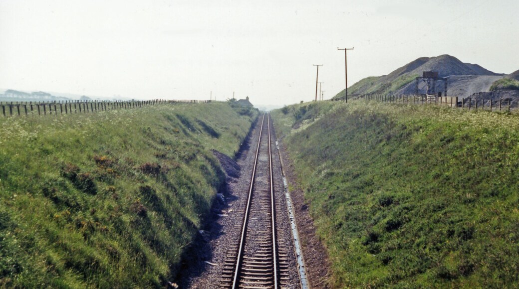 Approaching site of Bower station on line from Wick, 1986. View westward, towards Georgemas Junction and the south: ex-Highland Railway (Far North line), Inverness - Dingwall - Georgemas Junction - Thurso/Wick. The line remains active, but the former station - just visible ahead - was closed from 13/6/60 (goods 18/5/64).