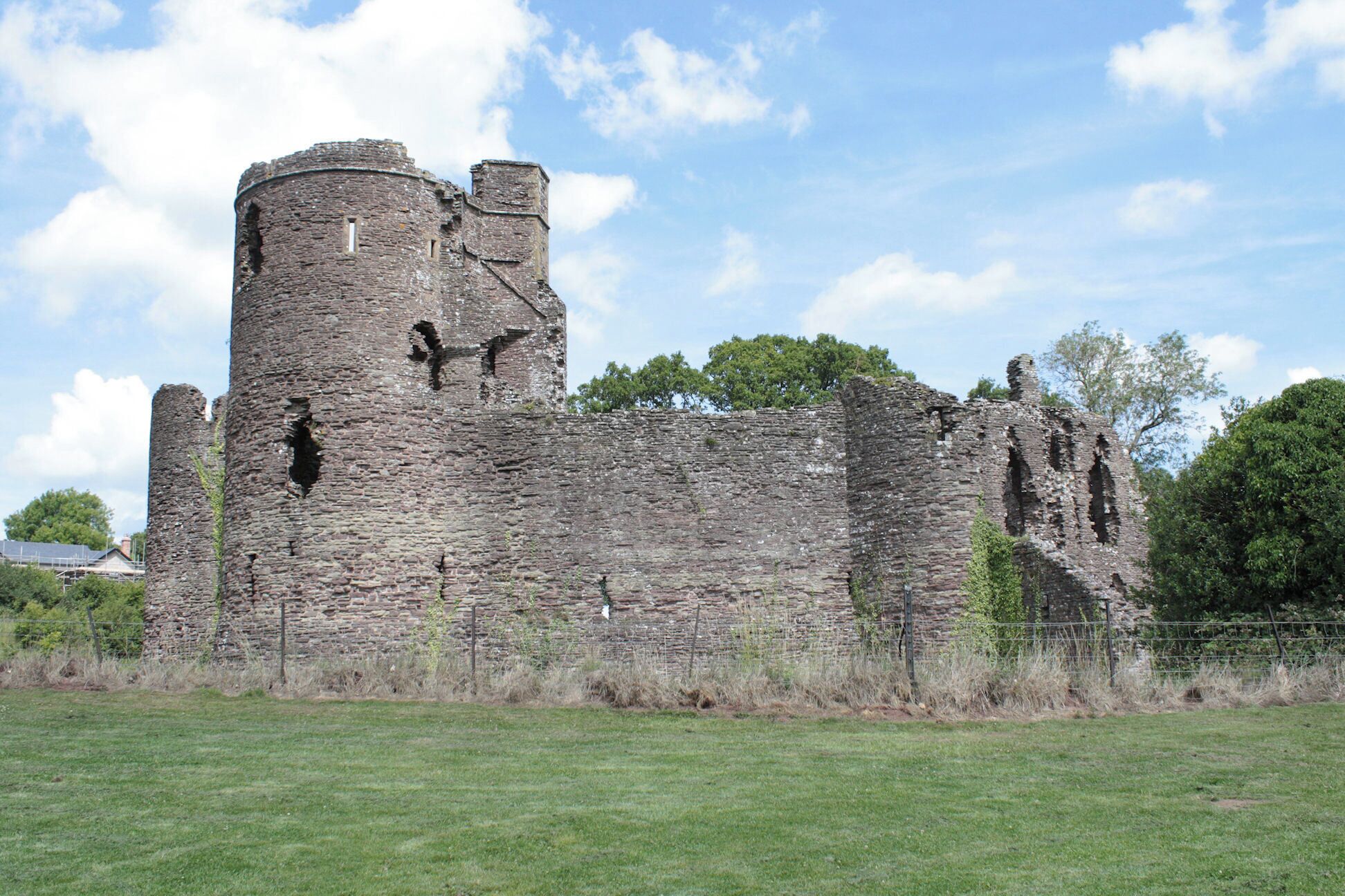 Grosmont Castle seen from the south. The round tower dominating the image is the south-west tower, and on the right is the gatehouse an entrance.