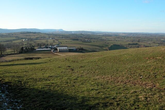 Grosmont Wood Farm, Grosmont. Grosmont Wood Farm is situated on the road from Pandy to Cross Ash. The road follows high ground and offers wonderful views, here looking north into Herefordshire and England. On this day the air was very clear giving a good view of the Black Mountains to the left and the hills of northern Herefordshire in the centre and to the right of this image.