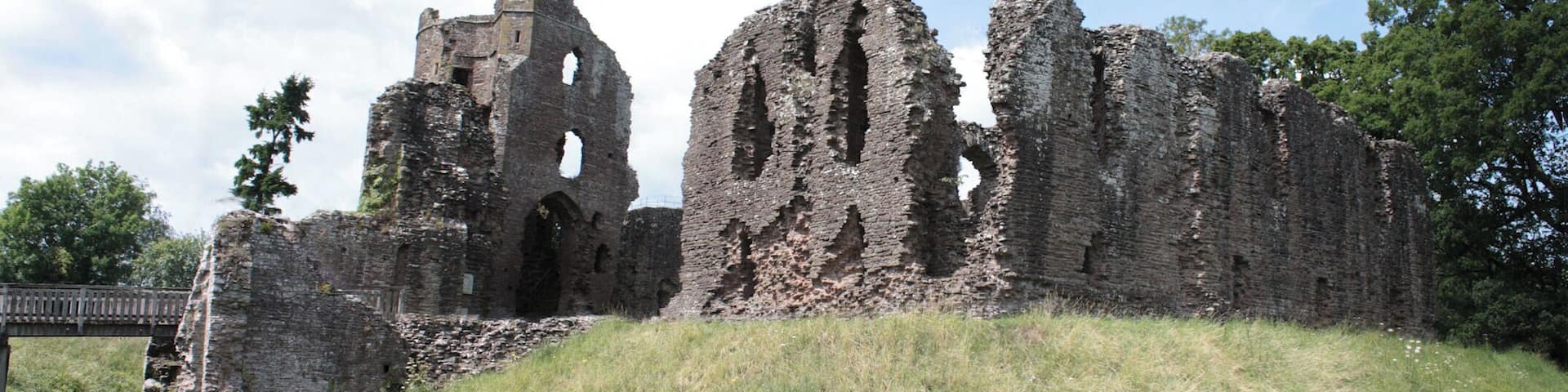 Grosmont Castle from the east. The ruined rectangular builing on the right is the early 13th-century Hall Block and to the left is the gatehouse.