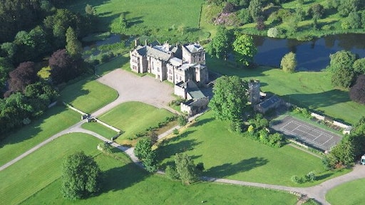 Greystoke Castle is in the village of Greystoke 8 km west of Penrith in the county of Cumbria in northern England.