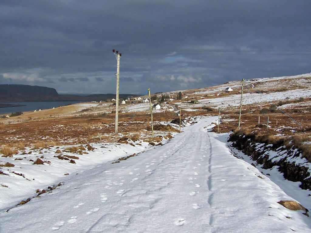 Track to the wind farm What used to be a farm track from Upper Edinbane has been rebuilt and extended and now forms a light vehicle access road to the new Edinbane wind farm. The water on the left is Loch Greshornish.