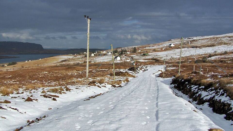 Track to the wind farm What used to be a farm track from Upper Edinbane has been rebuilt and extended and now forms a light vehicle access road to the new Edinbane wind farm. The water on the left is Loch Greshornish.