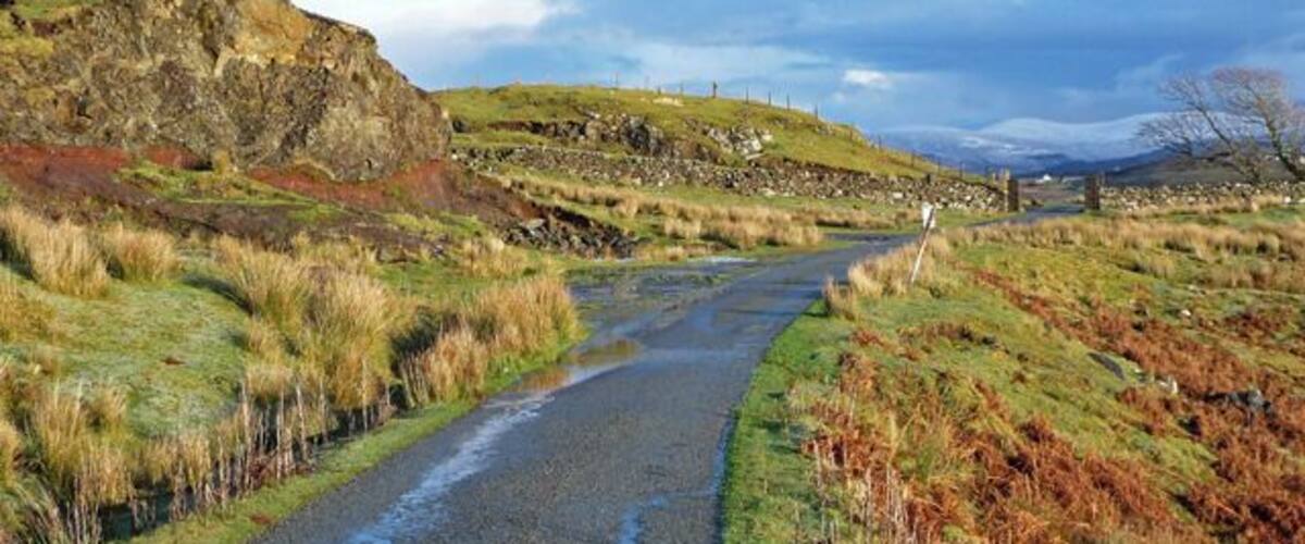 The road to Greshornish. Approaching the gateway though the drystane wall 658613 that marks the entry to the old Greshornish estate.