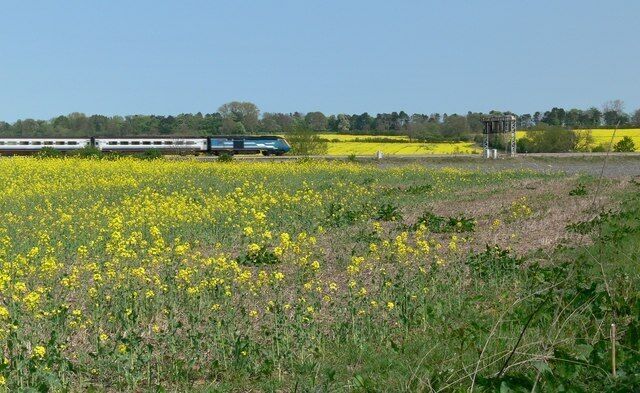 Railway line south of Great Glen near Leicester Photographed from the tow path of the Grand Union Canal.