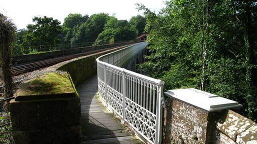 Corby Bridge, Wetheral, Cumbria. At the eastern end of the bridge walkway an inscription reads, "P Tate Engineer, CD Richardson Contractor, 1851.