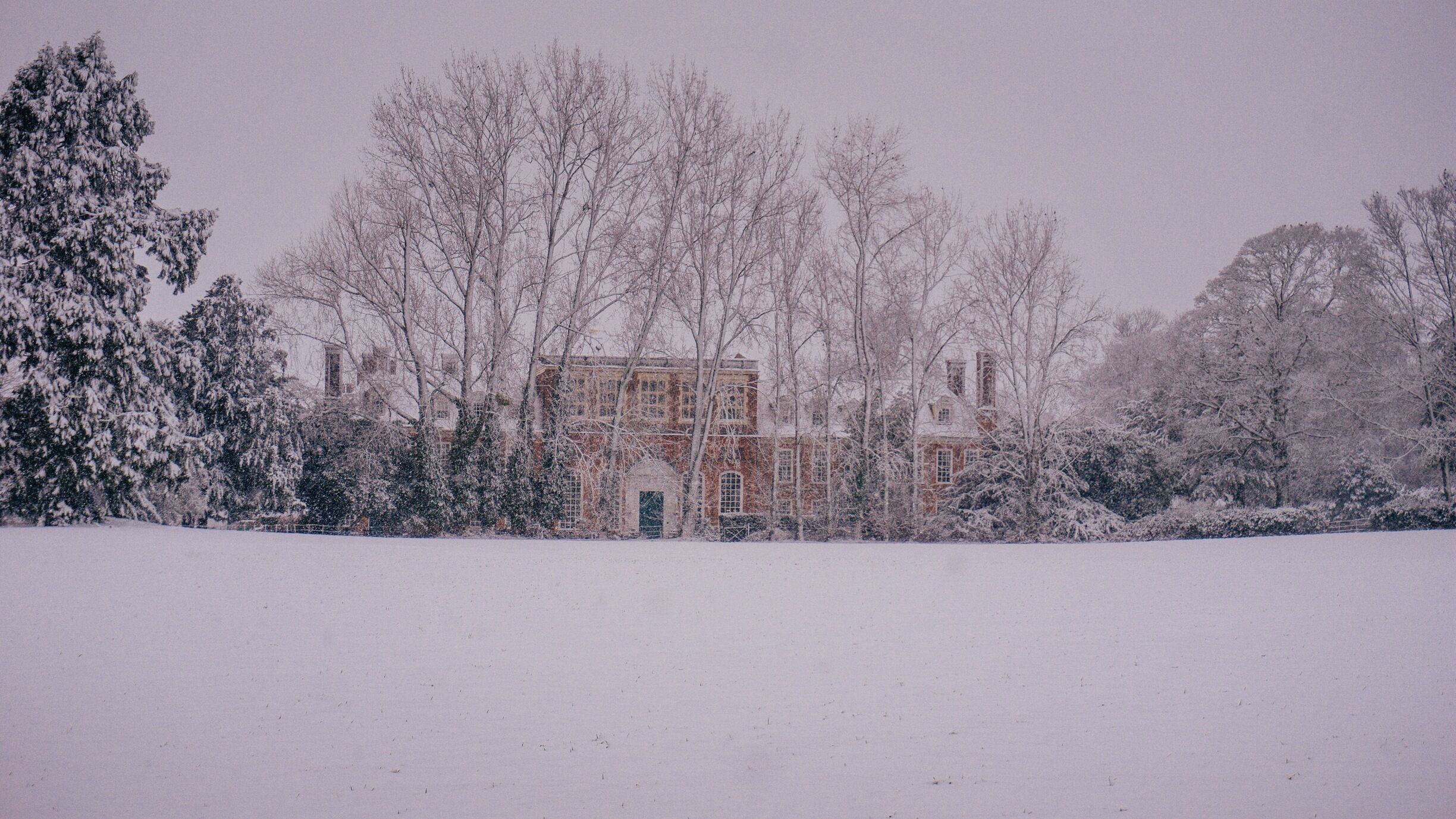 Gosfield Hall is a magnificent building with noble connections, home to many kings and queens in the past.  Overlooking a tranquil lake, the historical mansion is set among 10 acres of parkland in the heart of picturesque rural Essex. A seamless combination of Elizabethan charm and Georgian elegance, the grand interior of the house is home to the Queen’s Gallery, Grand Salon, Marquis of Buckingham’s former Ballroom and Library along with a number of stately bedrooms.


Externally, Gosfield Hall is equally as impressive. The property has retained many of his historical period features including its leaded windows, chimneys and clock and weathervane.


After being exiled from France King Louis XVIII of France and Navarre, and his Queen Mary-Josephe-Louise of Savoy took refuge in England.  Lord Buckingham had long been in sympathy of Royalsit France, and in 1807 offered to loan them Gosfield Hall.  They gratefully accepted this offer and along with a huge entourage of courtiers and staff they stayed there for the next couple of years. Over this time the Hall become a home of lavish French hospitality, with many social gatherings including such distinguished guests as the Prince Regent.  According to French tradition on Sunday's the villagers were allowed into the kitchen to see the dinner set out for the King, and on occasions were allowed into The Grand Salon to watch him dine.  King Louis and his Queen moved out of the Hall in 1809.    

#history #instone #landscape #december #winter #uk #britain #england #anglomania #gosfieldhall #snow #winterwonderland #weddingvenue