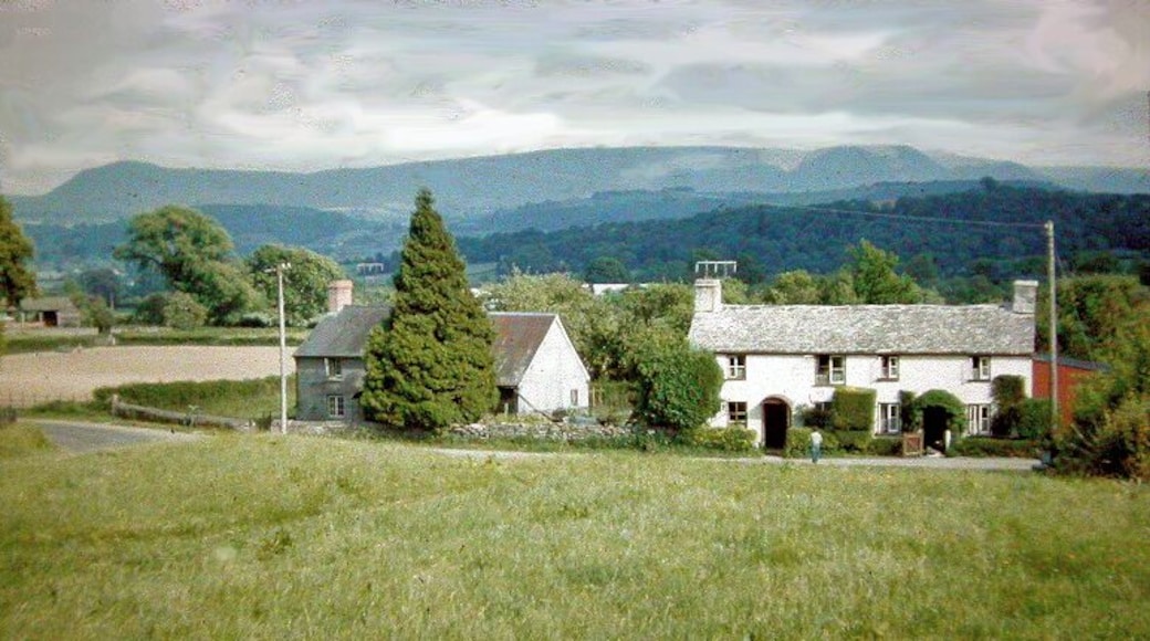 Across Wye Valley to Black Mountains from Boughrood Brest, 1962. View SE from B4350 near Boughrood Brest across Wye valley above Glasbury-on-Wye to the impressive north range of the Black Mountains (left-to-right: Hay Bluff (2,219 ft.), Lord Hereford's Knob (2,253 ft.), Waun Fach (2,660 ft.).