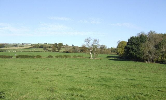 Pasture land north of the Wye The land rises gradually from the river northwards to The Begwns hills of south Radnorshire.