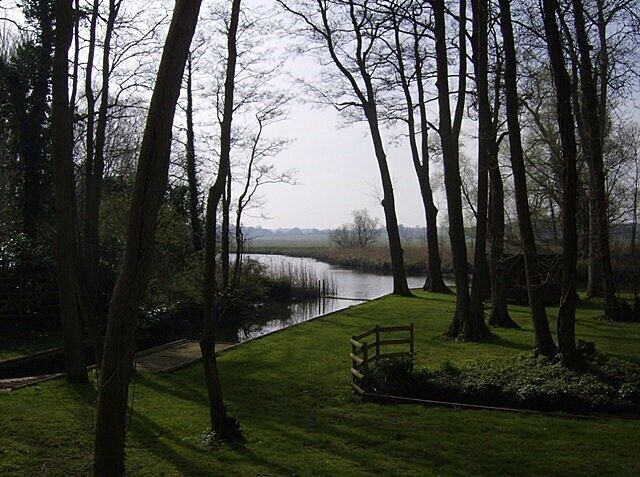 River Waveney at Dunburgh The footpath passes behind these private gardens and slipway at Dunburgh.