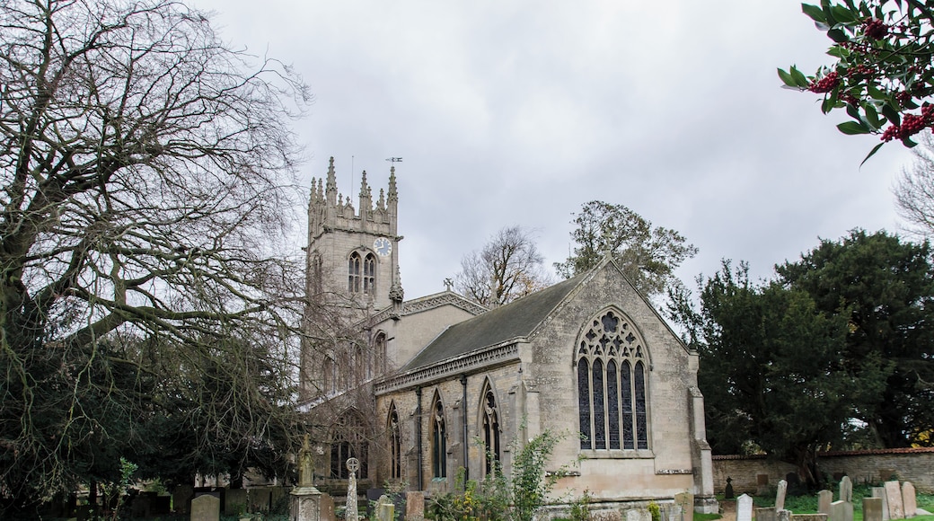 The church of St Nicholas is mainly of three periods, which may be dated around the years 1220, 1320 and 1470. There are some remnants in the church of an earlier building, for instance, the remains of the round Norman window, which can be seen in the south wall of the nave, the piece of carved stone built into the wall in the sanctuary. These two latter pieces of Norman work were dug up inside the church when the chancel arch was being restored in 1888. The only other piece of Norman work in the church is the font which is late Norman (around 1180). About the year 1220 the church was rebuilt, its length being the same as now, its width was somewhat less, the aisles being low and narrow. The roof was steep-pitched. Of this early 13th C. church there remains the pillars, the arcades, the lower part of the tower and the lower part of the chancel. The "trefoil" doorway into the chancel and the sedilia are Early English in date. About the year 1320 the side aisles were pulled down and the present aisles, porch and north and south doorways were built. The rounded C13 moulding giving way to a C14 pattern. The south aisle was apparently used as a side chapel with an altar at the east end. There still remains the brackets on which statues stood and the piscina, the floor of which has been delicately chiselled into the form of a cross. About the year 1470 the last great alteration to the church took place. The steep pitched roof gave way to a high flat roof and the church, which until now must have been dark, was lightened by the addition of clerestory windows. At the same time the tower was heightened and much of it rebuilt. The pinnacle at the south east corner of the clerestory carries the arms of the Myddletons of Fulbeck. The crest, a Saracens head surmounting a shield with a lion rampant, a belt with escallop shells supported on either side by a Harpy and a Wyvern. The Myddletons were the owners of Fulbeck from about the year 1430 to 1480. The church contains monuments to the Fanes of Fulbeck Hall.