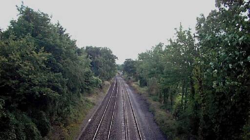 Railway line NW of Frocester. Looking north west from railway bridge on Peters's Street, NW of Frocester.