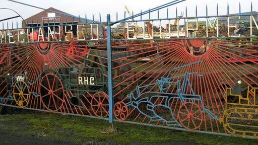 Crawford's gates These bespoke wrought iron gates must have been a wonderful advertisement for the wonders that lay within. The date on the left hand gate is 1944 and the machinery depicted is of monstrous proportions for that era.