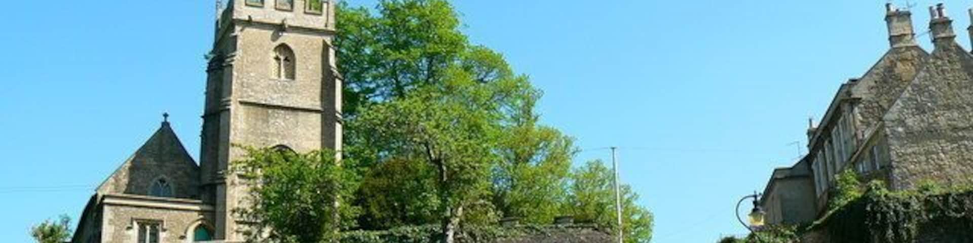 Up the hill to St Peter's church, Freshford Church Hill is out of shot behind the wall on the right. In the foreground are some sheep and goats. The hill is a steep one and this creates all sorts of parallax problems for an amateur like me.