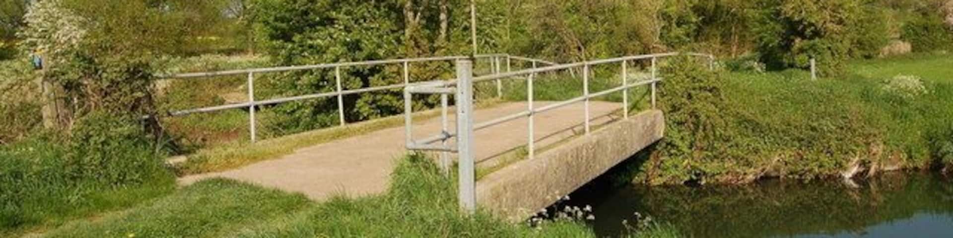 Stone bridge over the River Frome near Wheatenhurst View looks eastwards over this stone bridge that usually takes ramblers and agricultural vehicles across the River Frome.