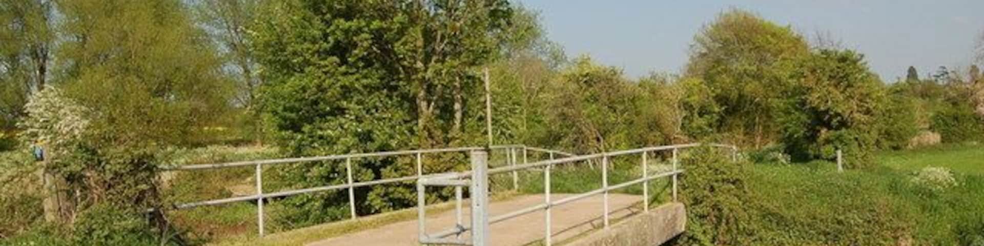 Stone bridge over the River Frome near Wheatenhurst View looks eastwards over this stone bridge that usually takes ramblers and agricultural vehicles across the River Frome.