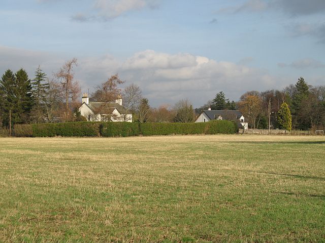 Forgandenny Looking across a field towards the cluster of houses around the school.