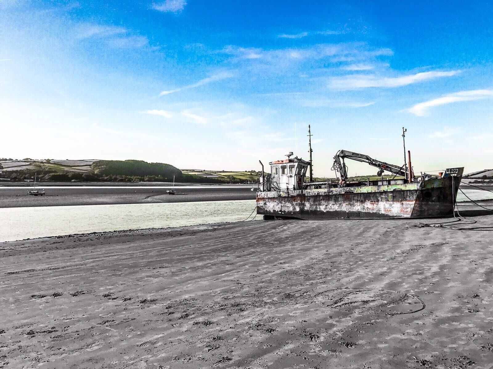 Taken at the seaside beach of ferry side. This boat has been there since I was young.