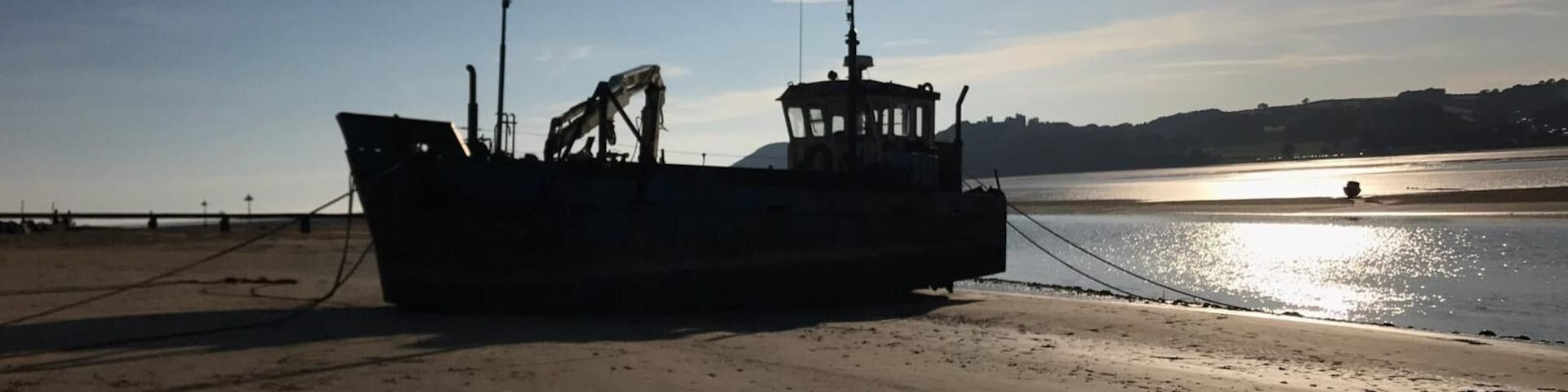 Taken at the seaside beach of ferry side. This boat has been there since I was young.